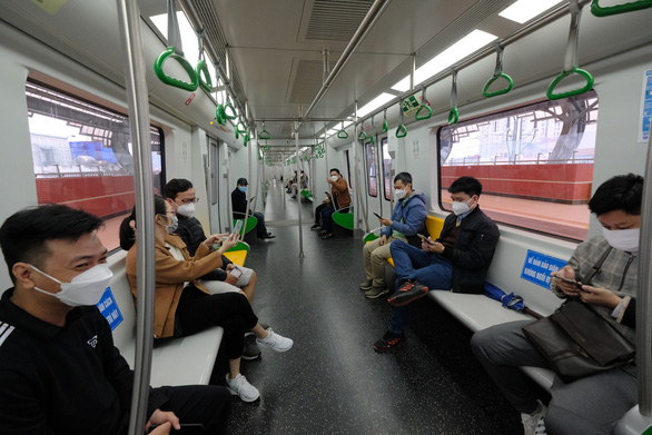 Passengers are seen inside a carriage of the elevated train that connects Dong Da and Ha Linh Districts in Hanoi, Vietnam. Photo: Nam Tran / Tuoi Tre
