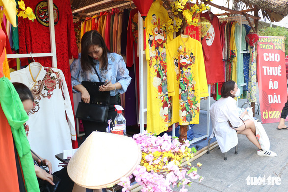 An area displaying ‘ao dai’ (Vietnamese traditional dress) for rent at the festival. Photo: Hoang An / Tuoi Tre