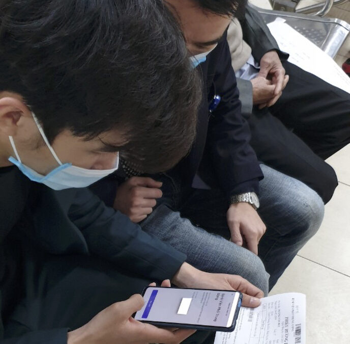 A patient uses Dhealth Foundation's app at Hanoi Lung Hospital in a supplied photo