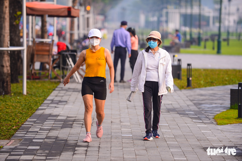 Locals exercise at Bach Dang Wharf Park in District 1, Ho Chi Minh City. Photo: Tuoi Tre