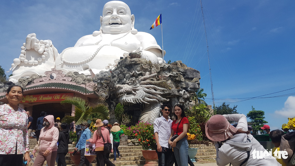 Visitors gather at the Maitreya Buddha Statue area on the top of Cam Mountain in Tinh Bien District, An Giang Province, Vietnam. Photo: Buu Dau / Tuoi Tre