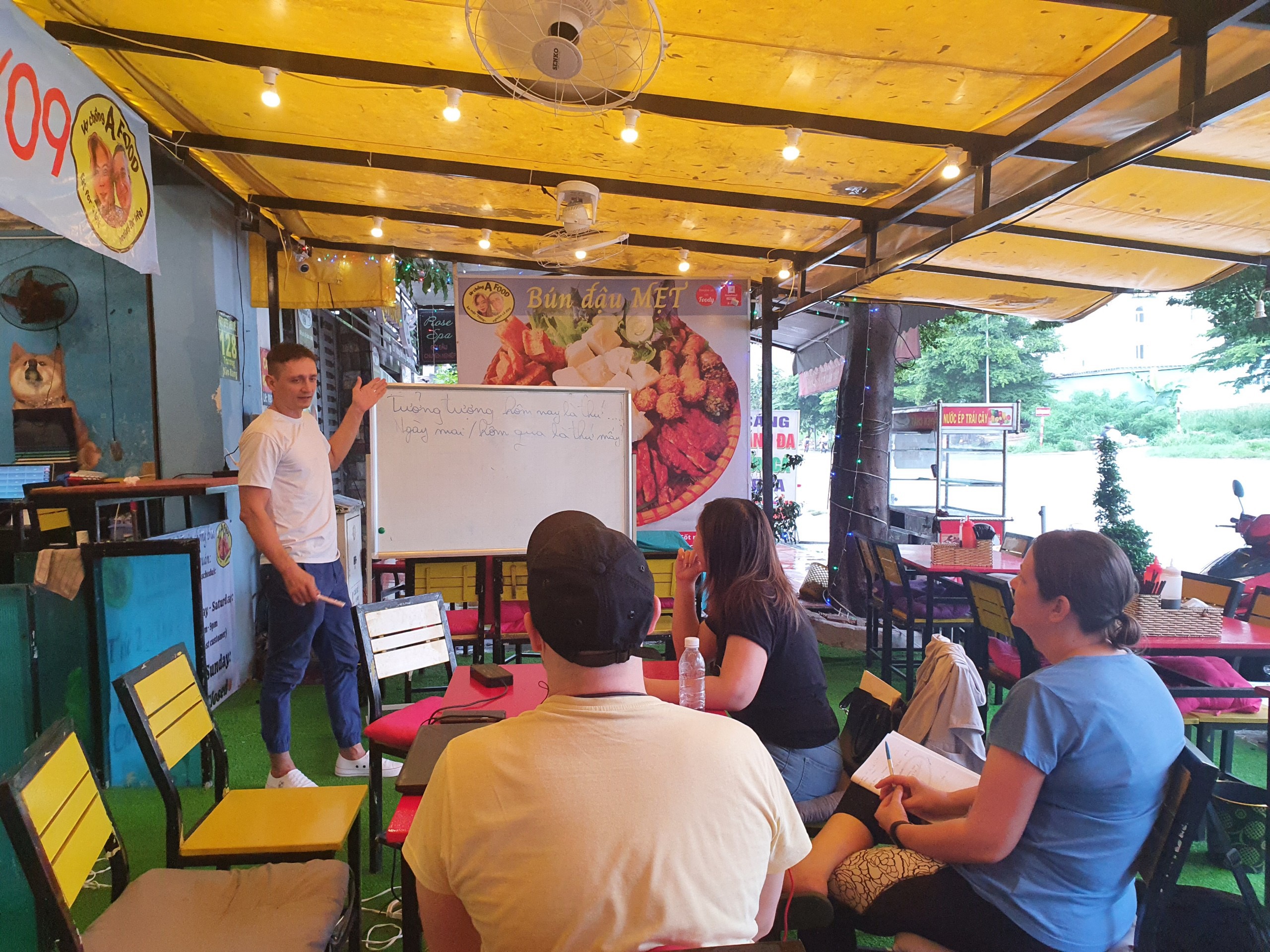 Valentin Constantinescu is seen teaching English for foreigners in Vietnam in this supplied photo.