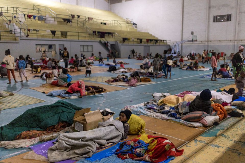 Locals find shelter at an evacuation centre, as Cyclone Batsirai sweeps inland, in Fianarantsoa, Madagascar, February 6, 2022. Photo: Reuters