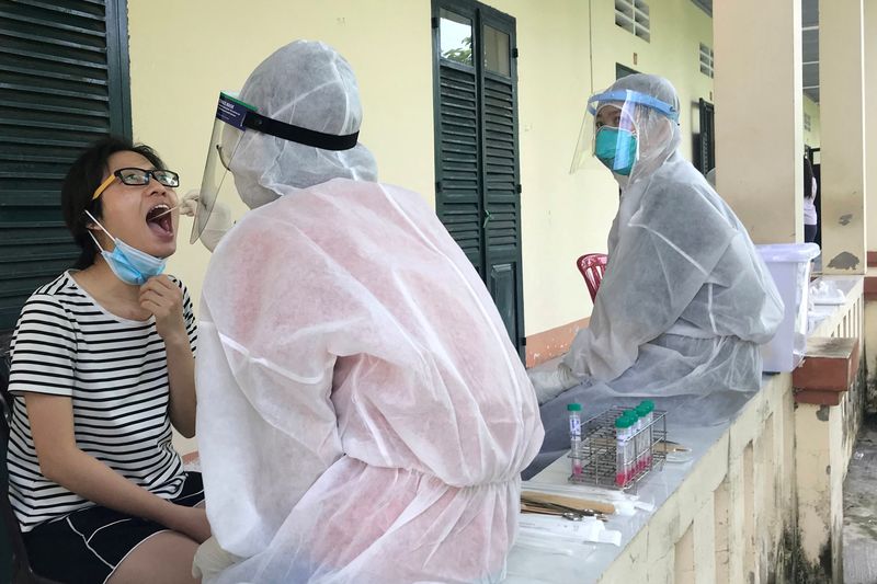 Vietnam warns of hospitals strain as COVID-19 cases spike after holiday