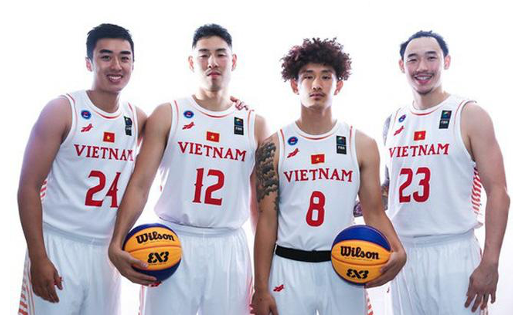 Justin Young (second left) and Tam Dinh (first right) both play for the Vietnamese national basketball team. Photo: VBA
