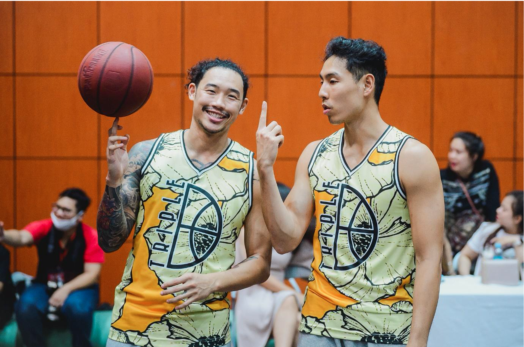 Justin Young (right) and Tam Dinh promote the development of basketball at an amateur tournament. Photo: VBA