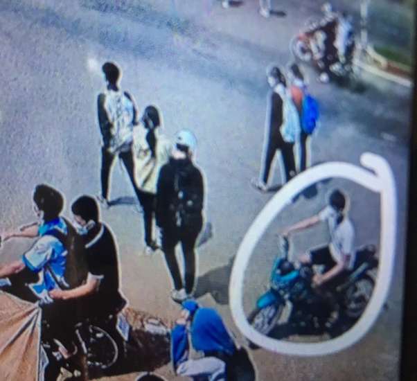 One of the suspects is caught on camera prior to the attack in front of Nguyen Du Middle School in Binh Phuoc Province, Vietnam, February 19, 2022. Photo: Tuoi Tre contributor