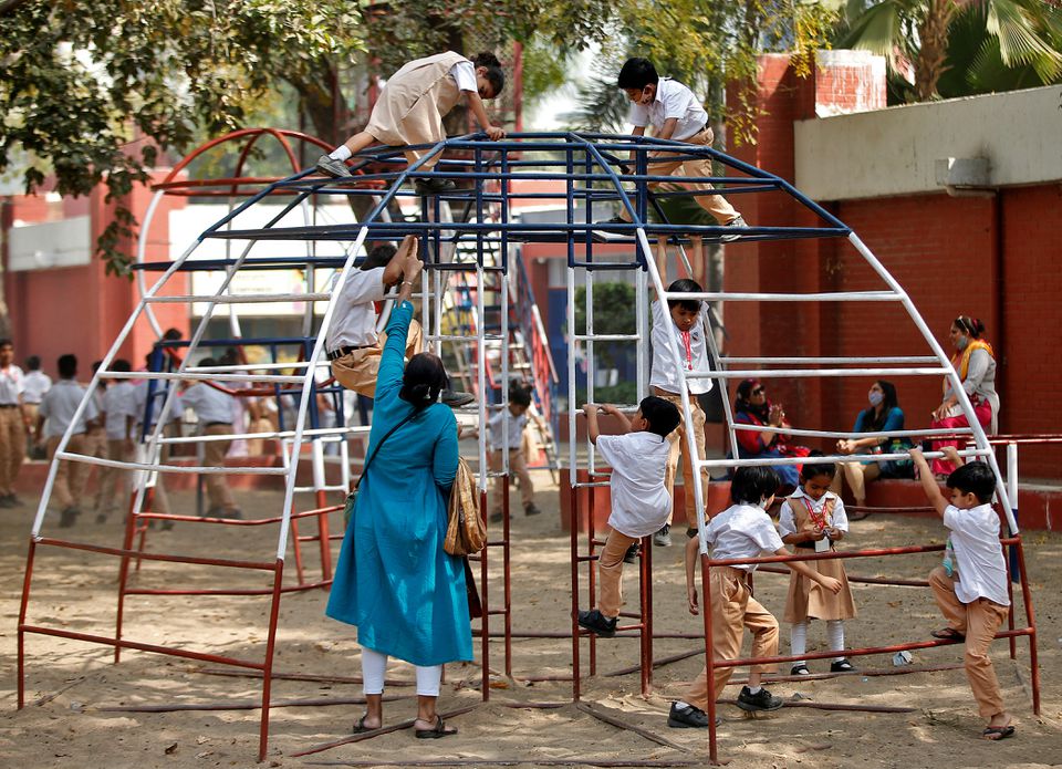 Students play during recess at a school after a majority of schools were reopened following their closure due to the coronavirus disease (COVID-19) pandemic, in Ahmedabad, India, February 25, 2022. Photo: Reuters