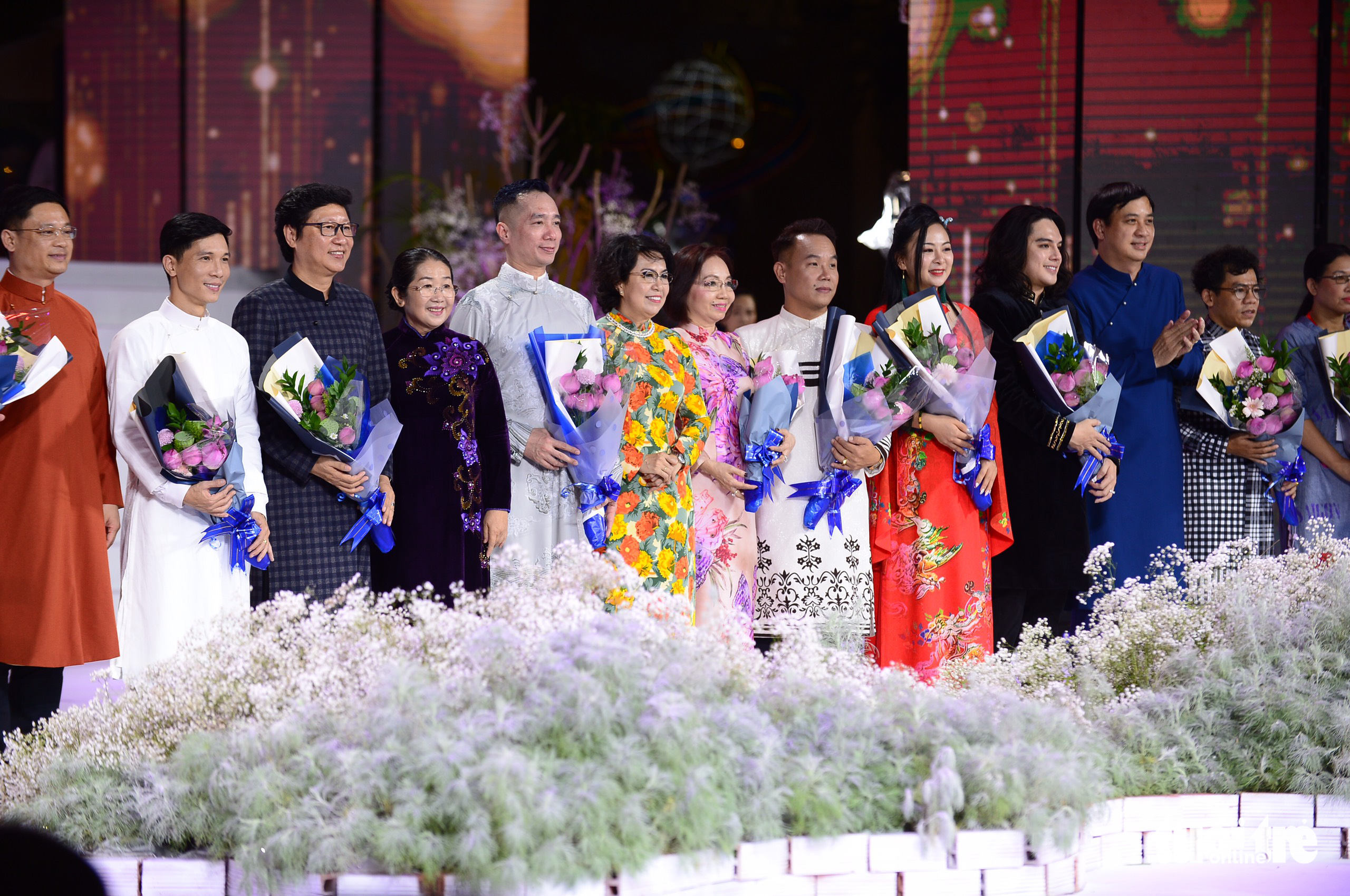 The eighth Ho Chi Minh City Ao Dai Festival kicks off on Nguyen Hue Pedestrian Street in District 1, March 5, 2022. Photo: Quang Dinh / Tuoi Tre