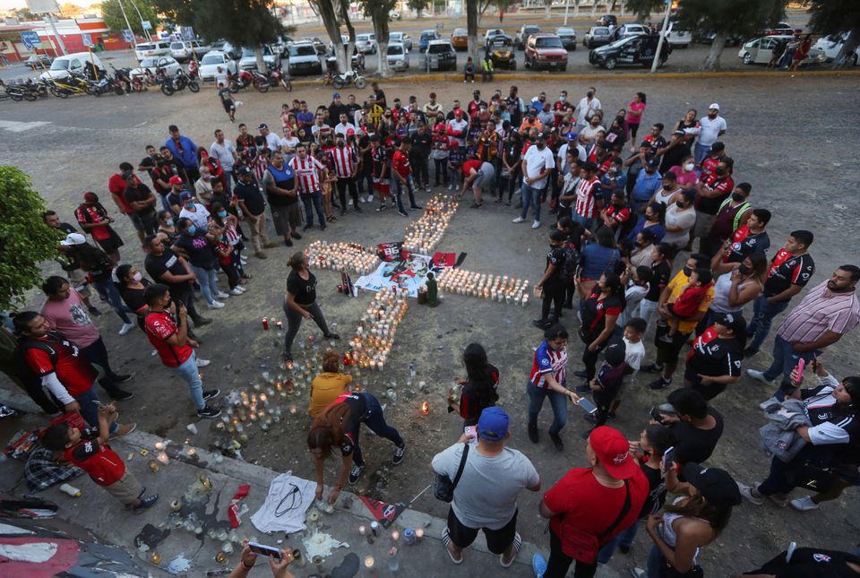 Fans of soccer team Atlas gather after violent clashes broke out between fans of Atlas and Queretaro, during a match at the La Corregidora stadium in Queretaro, that left two dozen people hospitalized, in Guadalajara, Mexico March 6, 2022. Photo: Reuters