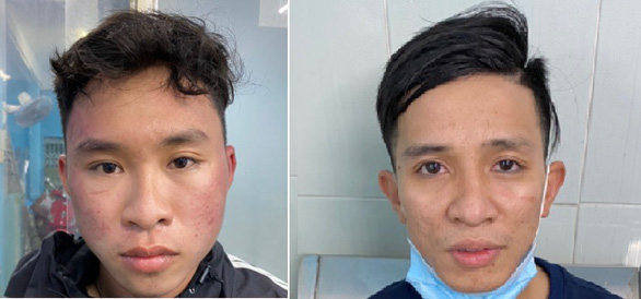 Nguyen Huynh Anh Khoa (L) and Nguyen Hoang Phuc are currently being held at a local police station for snatching a smartphone from a man standing on the sidewalk in District 3. Photo: A.X. / Tuoi Tre