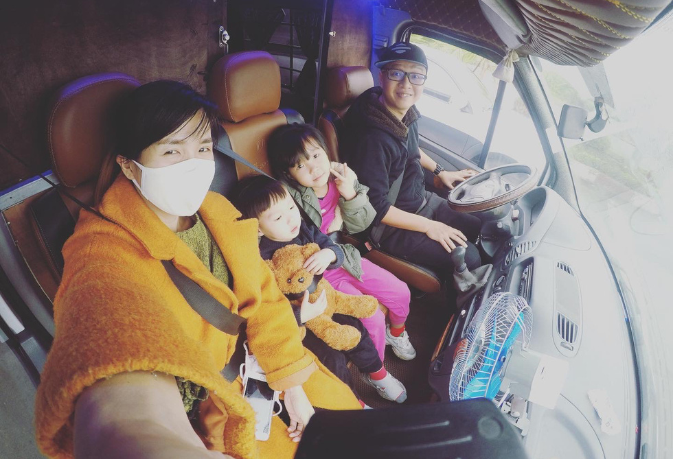 Luong Lam Son and his family members take a selfie photo in the motorhome during a trip. Photo: Lam Son / Handout via Tuoi Tre