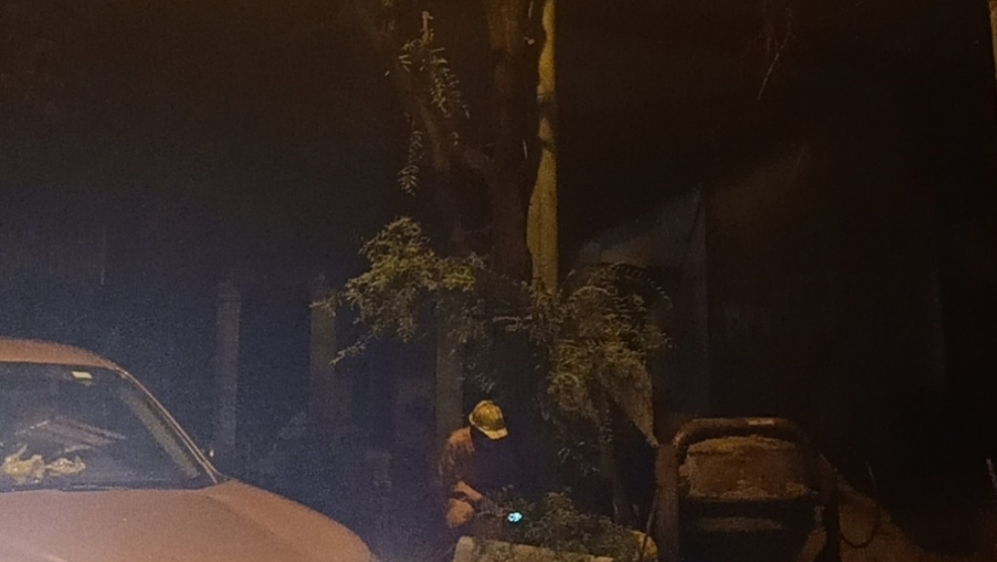 An electrical technician examines power and communication cables near a street light after an electrocution incident killed two men in Thu Dau Mot City, Binh Duong Province, Vietnam, April 4, 2022. Photo: Thu Dau Mot Power Corporation