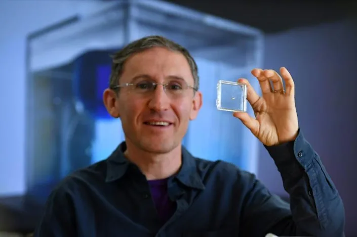 Bionaut Labs CEO and founder Michael Shpigelmacher displays the tiny remote-controlled medical micro-robot called Bionaut which his company is developing for medical treatments. Photo: AFP