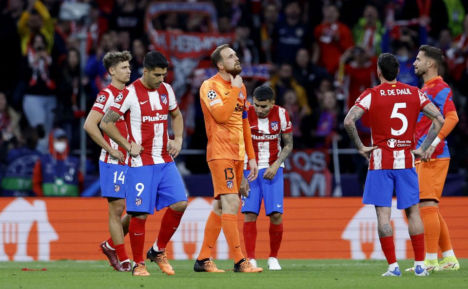 Soccer Football - Champions League - Quarter Final - Second Leg - Atletico Madrid v Manchester City - Wanda Metropolitano, Madrid, Spain - April 13, 2022 Atletico Madrid's Jan Oblak looks dejected after the match with teammates. Photo: Reuters