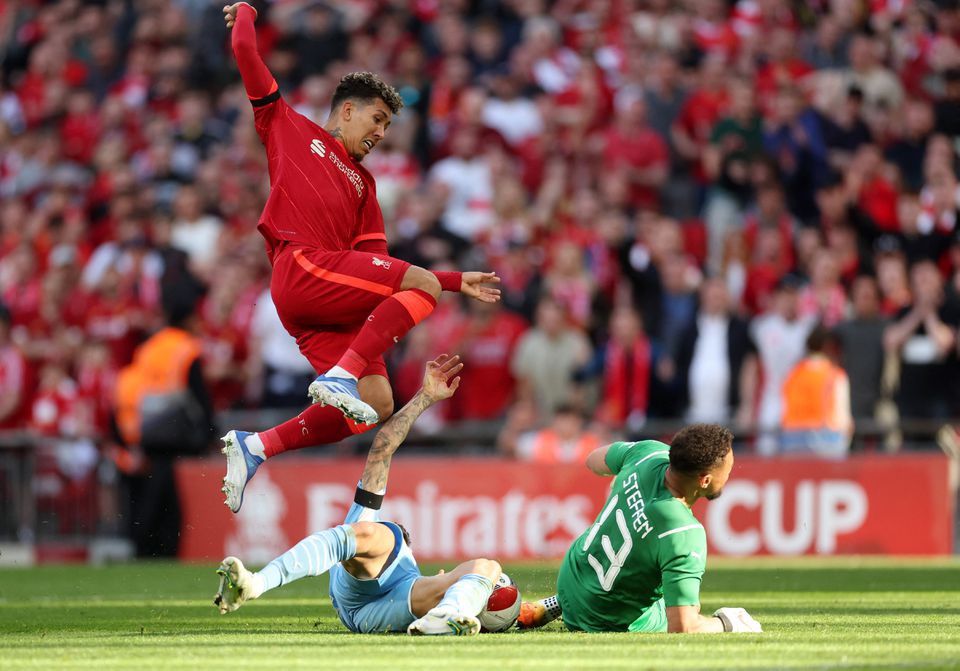 Soccer Football - FA Cup Semi Final - Manchester City v Liverpool - Wembley Stadium, London, Britain - April 16, 2022 Manchester City's Zack Steffen in action with Liverpool's Roberto Firmino. Photo: Action Images via Reuters