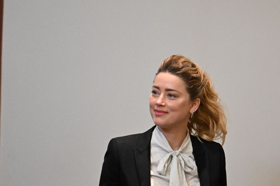 Actor Amber Heard arrives at the Fairfax County Circuit Courthouse as the defamation case brought against her by her ex-husband Johnny Depp continues, in Fairfax, Virginia, U.S., April 19, 2022. Jim Watson/Pool via Reuters