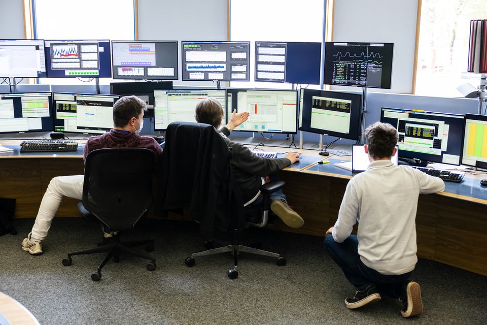 People work in the European Organization for Nuclear Research (CERN) Control Centre in Meyrin near Geneva, Switzerland, April 13, 2022. Photo: Reuters