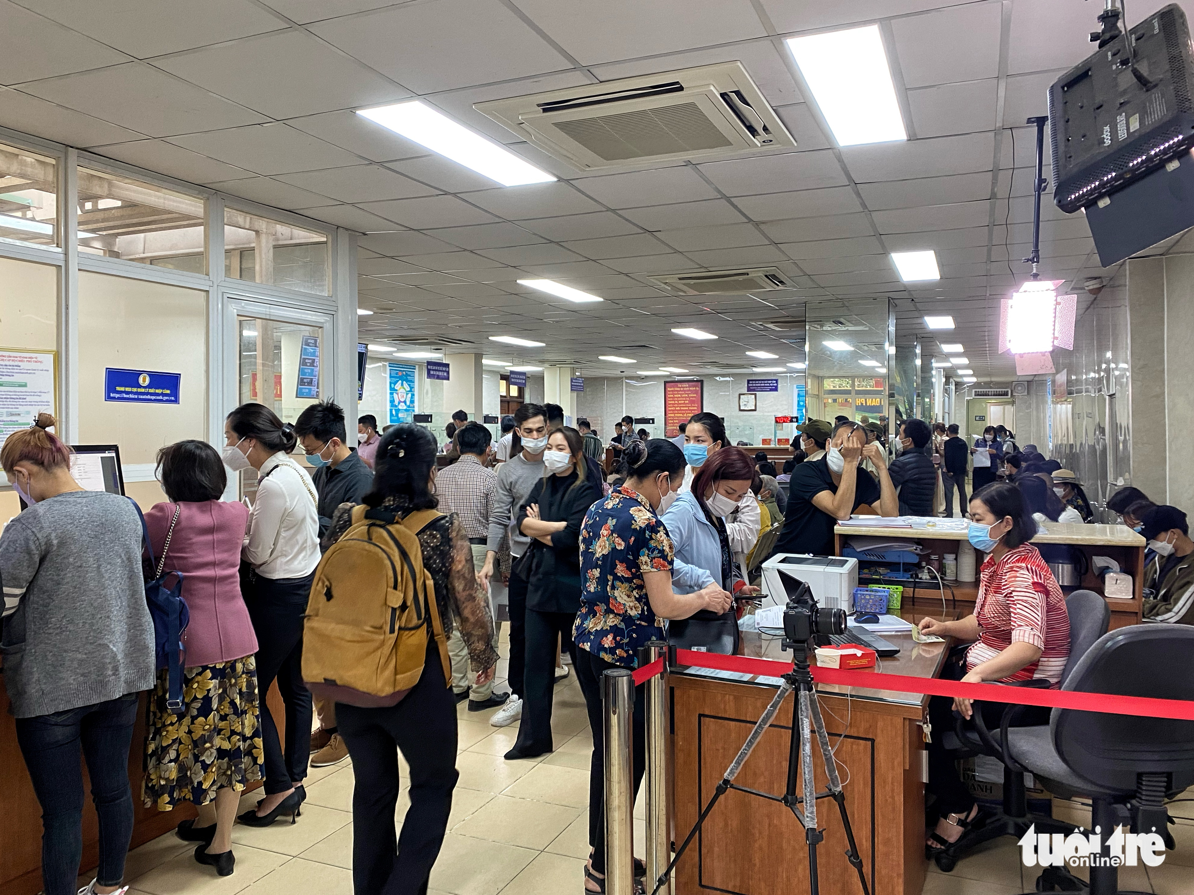 Residents crowd immigration department for passport application in Hanoi