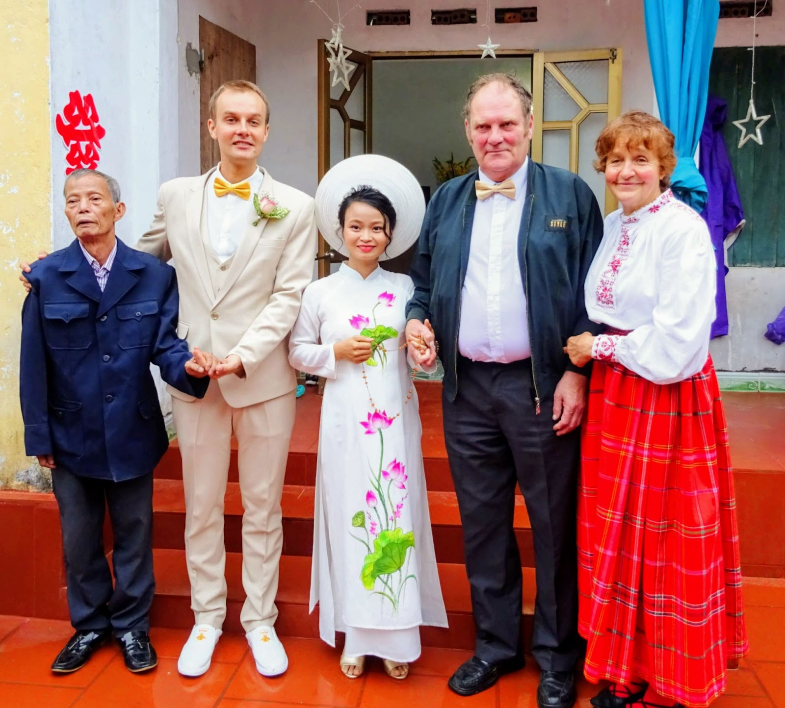 Estonian Meigo Mark (second from left) and his wife Nguyen Thi Sam pose for a picture with their family members at their wedding in Thai Binh Province, Vietnam in October, 2018. Photo by courtesy by Meigo Mark