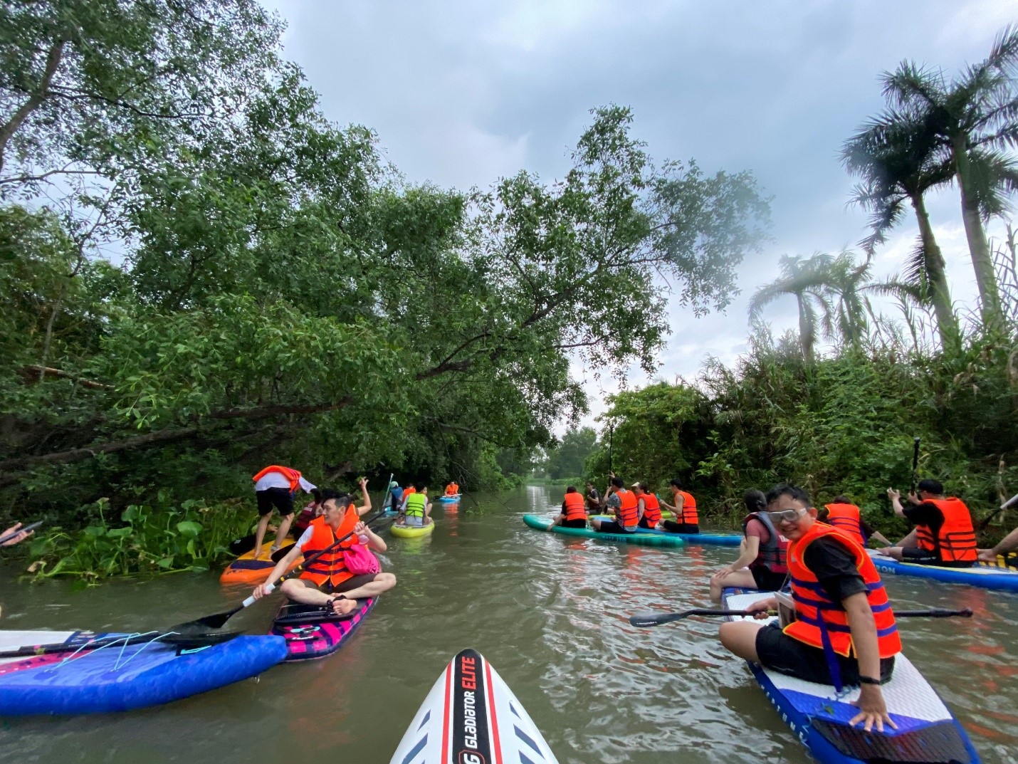 What’s SUP!?: Stand-up paddle boarding makes a splash with young people in Ho Chi Minh City