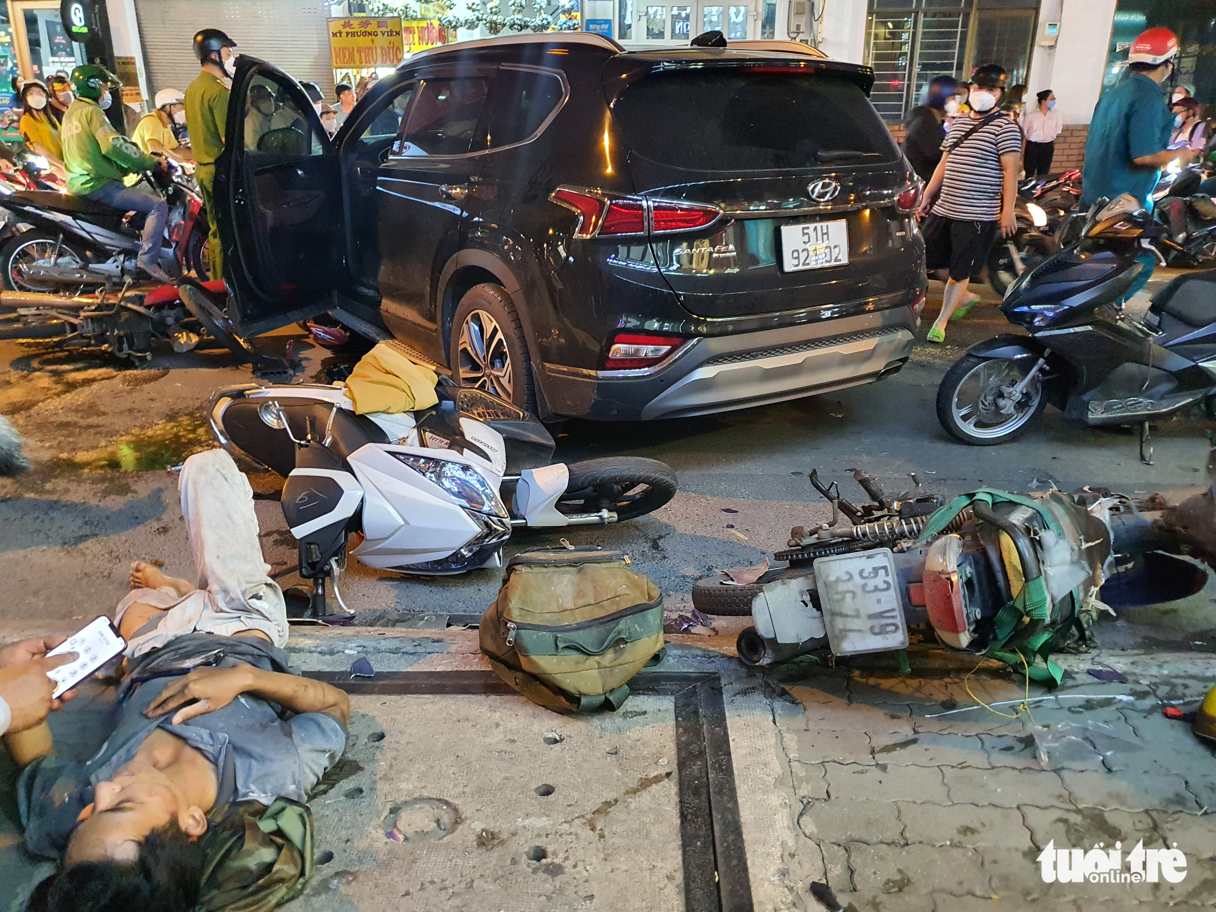 Four injured as car slams into 10 motorbikes in Ho Chi Minh City