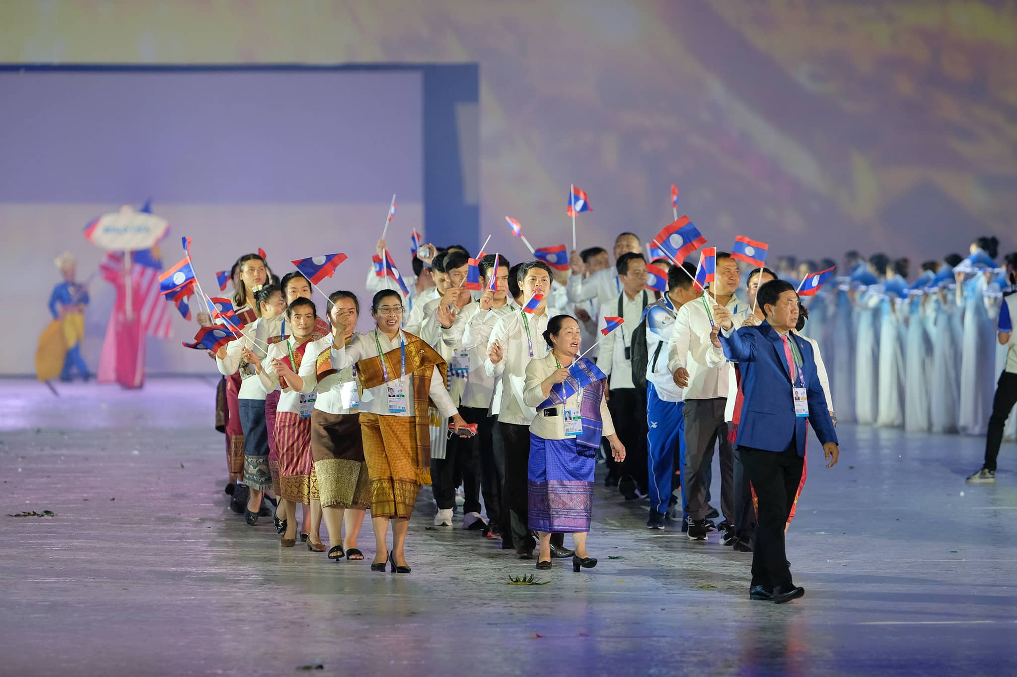 Lao delegates wave during the opening ceremony of the 31st Southeast Asian (SEA) Games at My Dinh National Stadium in Hanoi, Vietnam, May 12, 2022. Photo: Nam Tran / Tuoi Tre