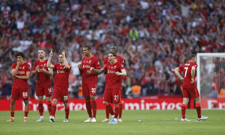 Soccer Football - FA Cup - Final - Chelsea v Liverpool - Wembley Stadium, London, Britain - May 14, 2022 Liverpool's James Milner looks away as his teammates react after Roberto Firmino scores his penalty during the shoot-out. Photo: Action Images via Reuters