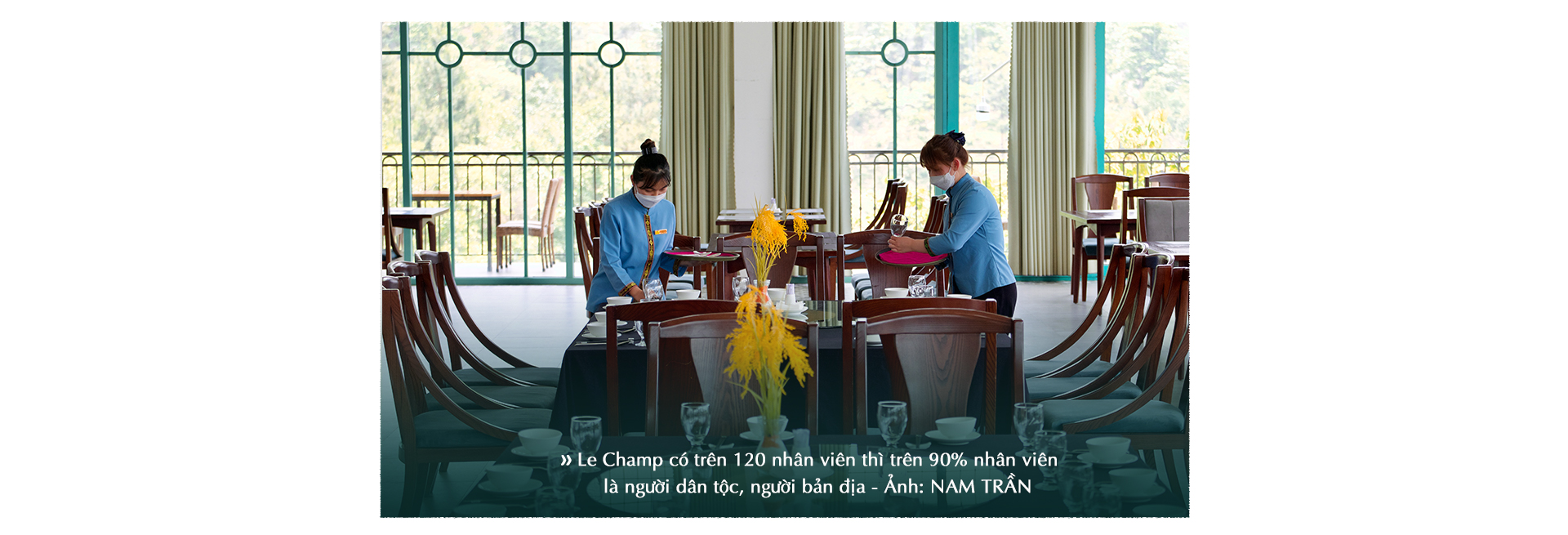 Waitresses prepare a table in the dining hall at Le Champ Tu Le Resort Hot Spring & Spa in Van Chan District, Yen Bai Province, Vietnam. Photo: Nam Tran / Tuoi Tre