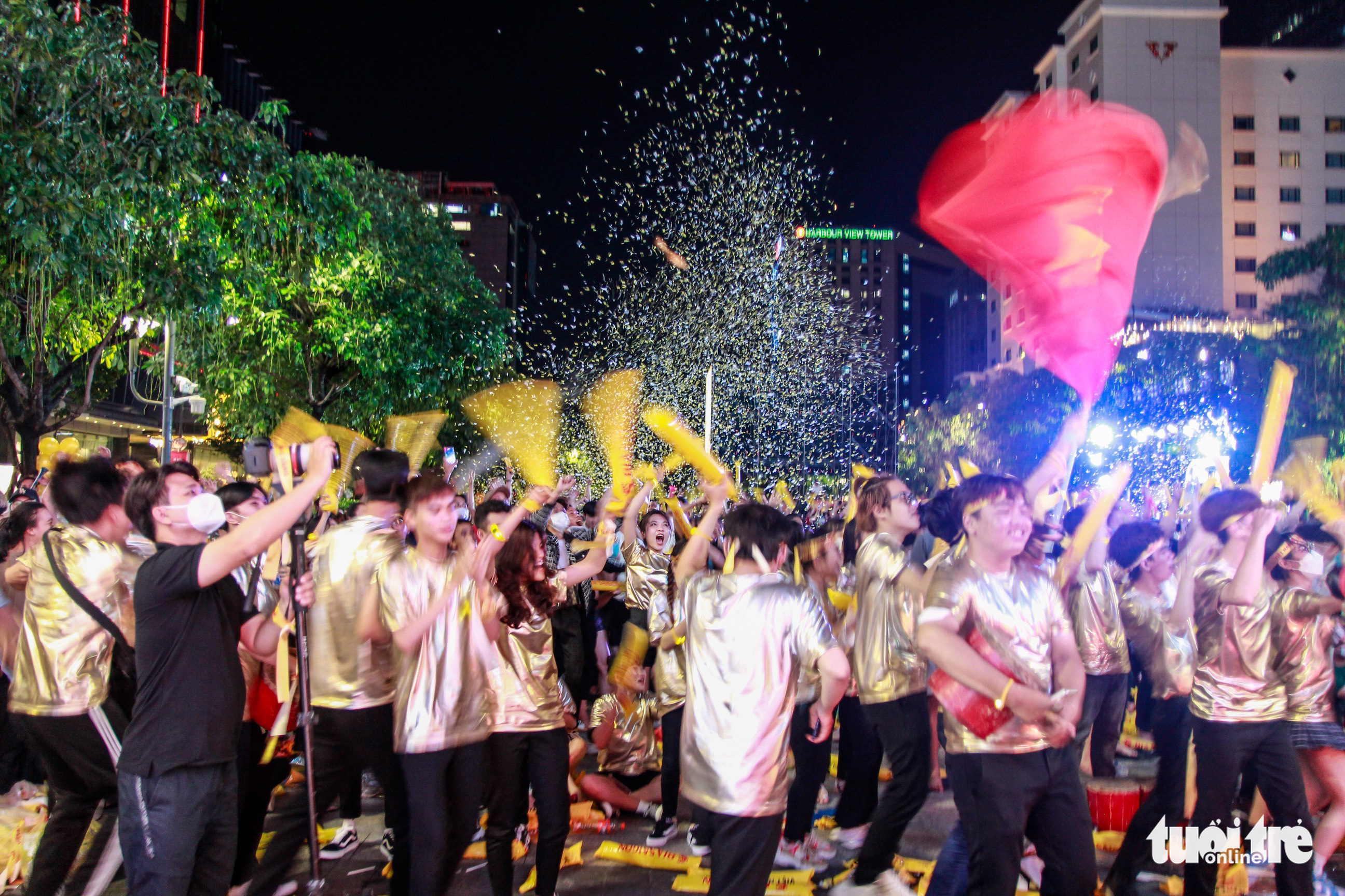 Football fans flood Ho Chi Minh City pedestrian street to celebrate semifinal victory