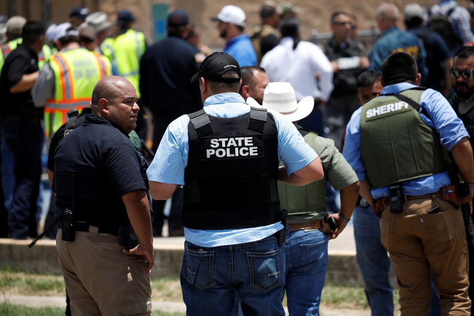 Law enforcement personnel guard the scene of a suspected shooting near Robb Elementary School in Uvalde, Texas, U.S. May 24, 2022. Photo: Reuters