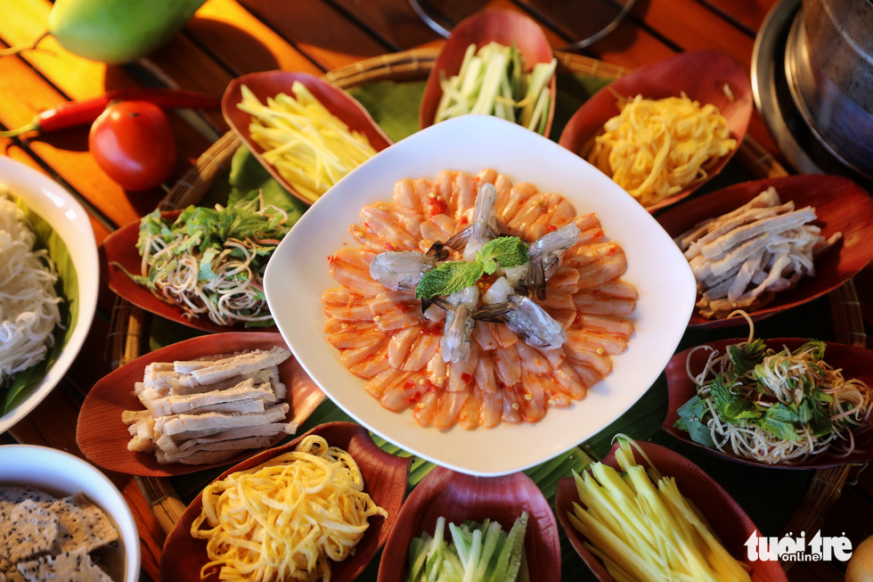 A ‘lau tha’ hotpot is served in Phan Thiet City, south-central Vietnam. Photo: Ha Manh / Tuoi Tre