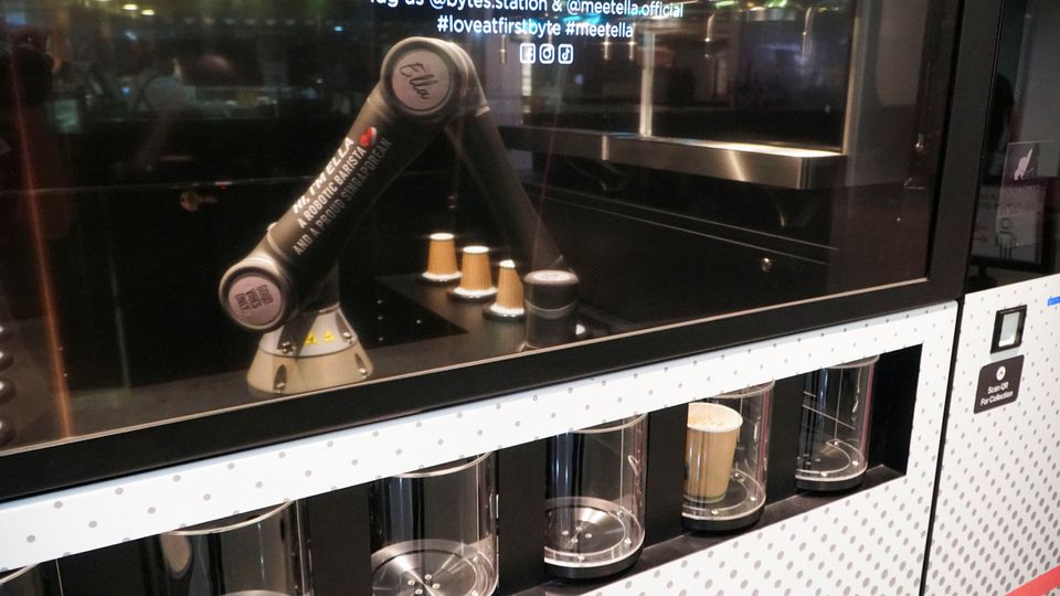 Robot barista 'Ella', designed by Crown Digital, makes a coffee autonomously after receiving orders, in Singapore, April 26, 2022. Photo: Reuters