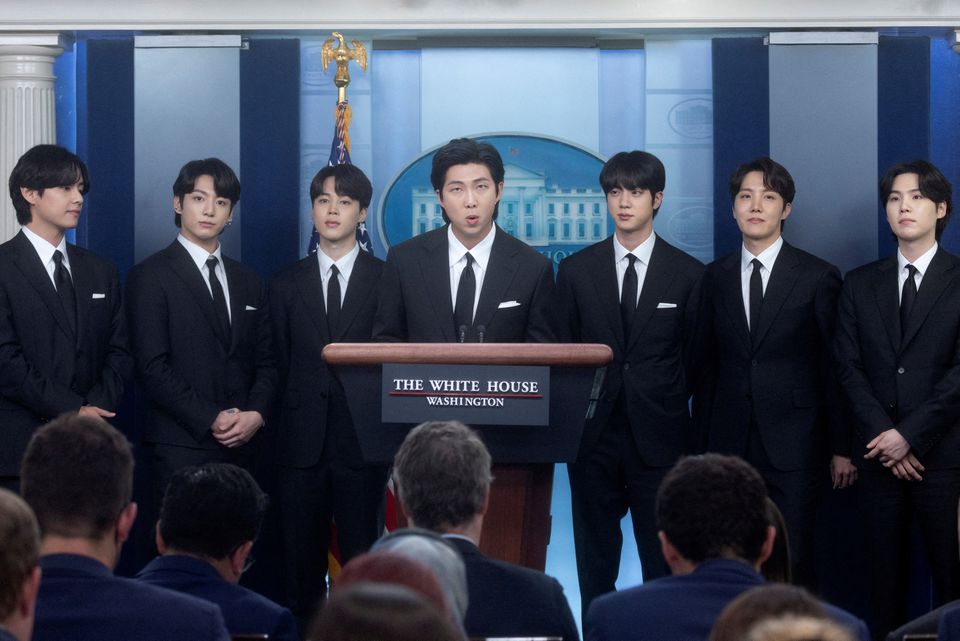 Kim Namjoon of the K-Pop band BTS and fellow members, (not in order), Kim Taehyung, Kim Seokjin, Jeon Jeongguk, Park Jimin, Jung Hoseok and Min Yoon-gi make statements against anti-Asian hate crimes and for inclusion and representation during the daily briefing at the White House in Washington, U.S., May 31, 2022. Photo: Reuters