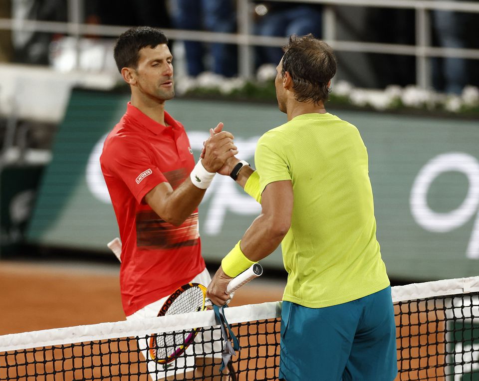 Tennis - French Open - Roland Garros, Paris, France - June 1, 2022 Spain's Rafael Nadal shakes hands with Serbia's Novak Djokovic after winning their quarter final match. Photo: Reuters