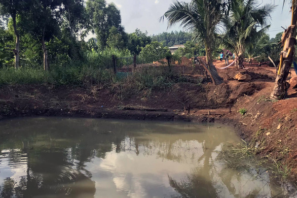 The pond where two children drowned in Dak Nong Province, Vietnam, June 1, 2022. Photo: Q.V. / Tuoi Tre