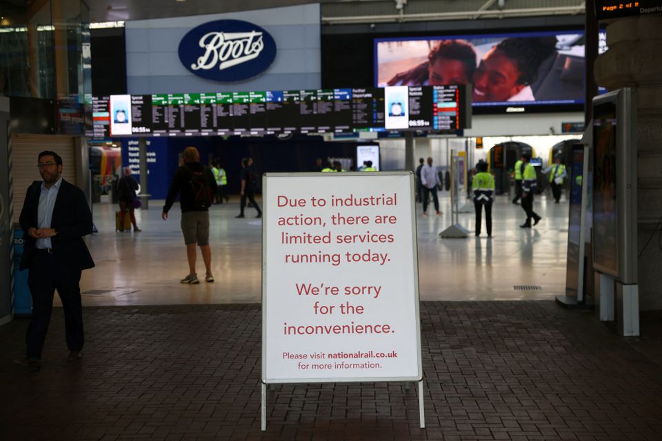 A sign displaying info is seen at Waterloo station, on the first day of national rail strike in London, Britain, June 21, 2022. Photo: Reuters