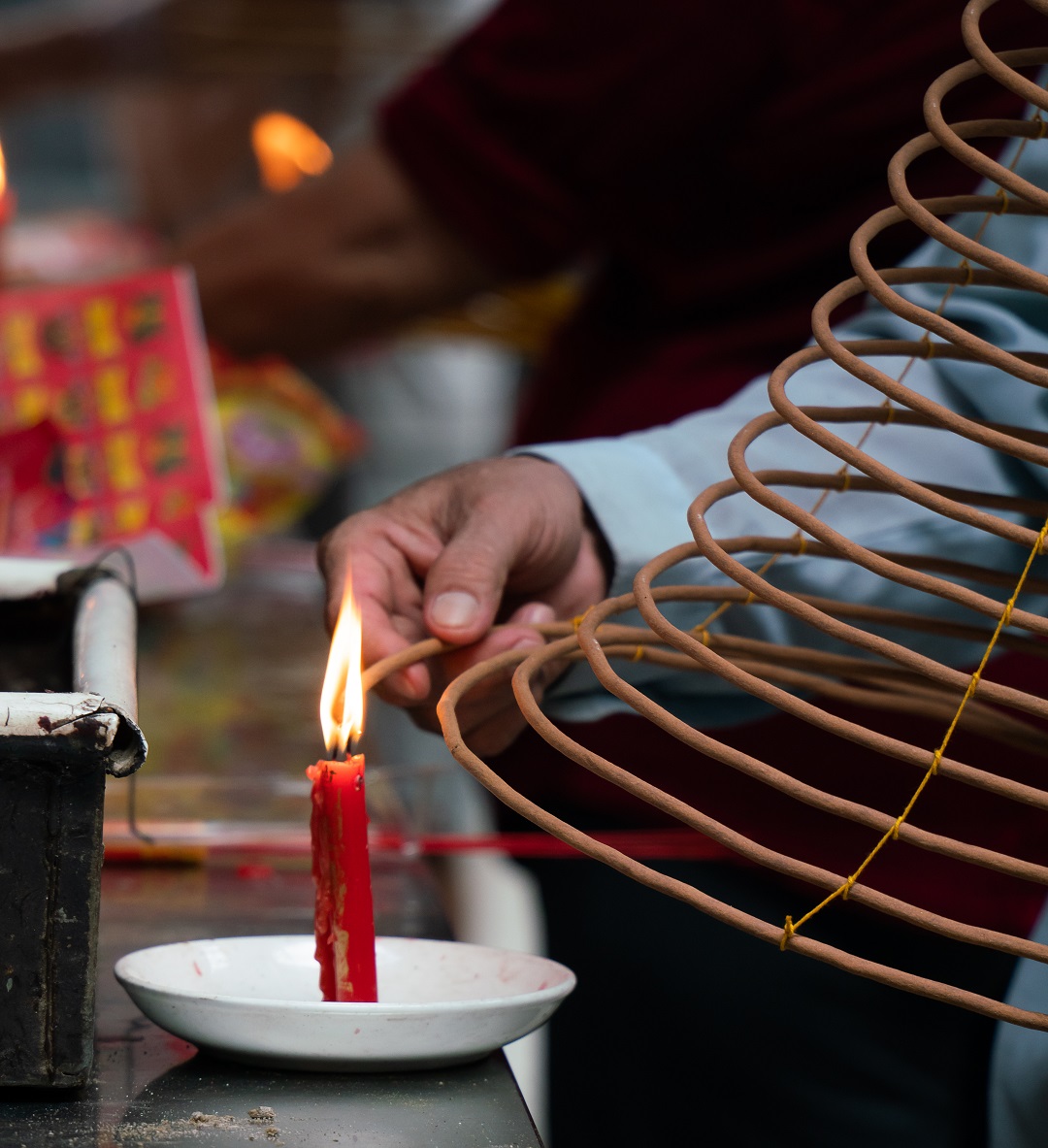 Conical incense coils are often used in the temple. Visitors tend to buy such incense coils and burn and hang them from the roof of the temple to pray for peace and good luck. Photo: Nguyen Trung Au / Tuoi Tre News