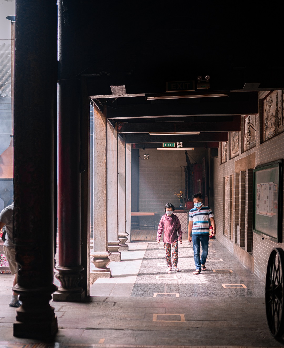 Two people walk along a way from the main entrance. Photo: Nguyen Trung Au / Tuoi Tre News