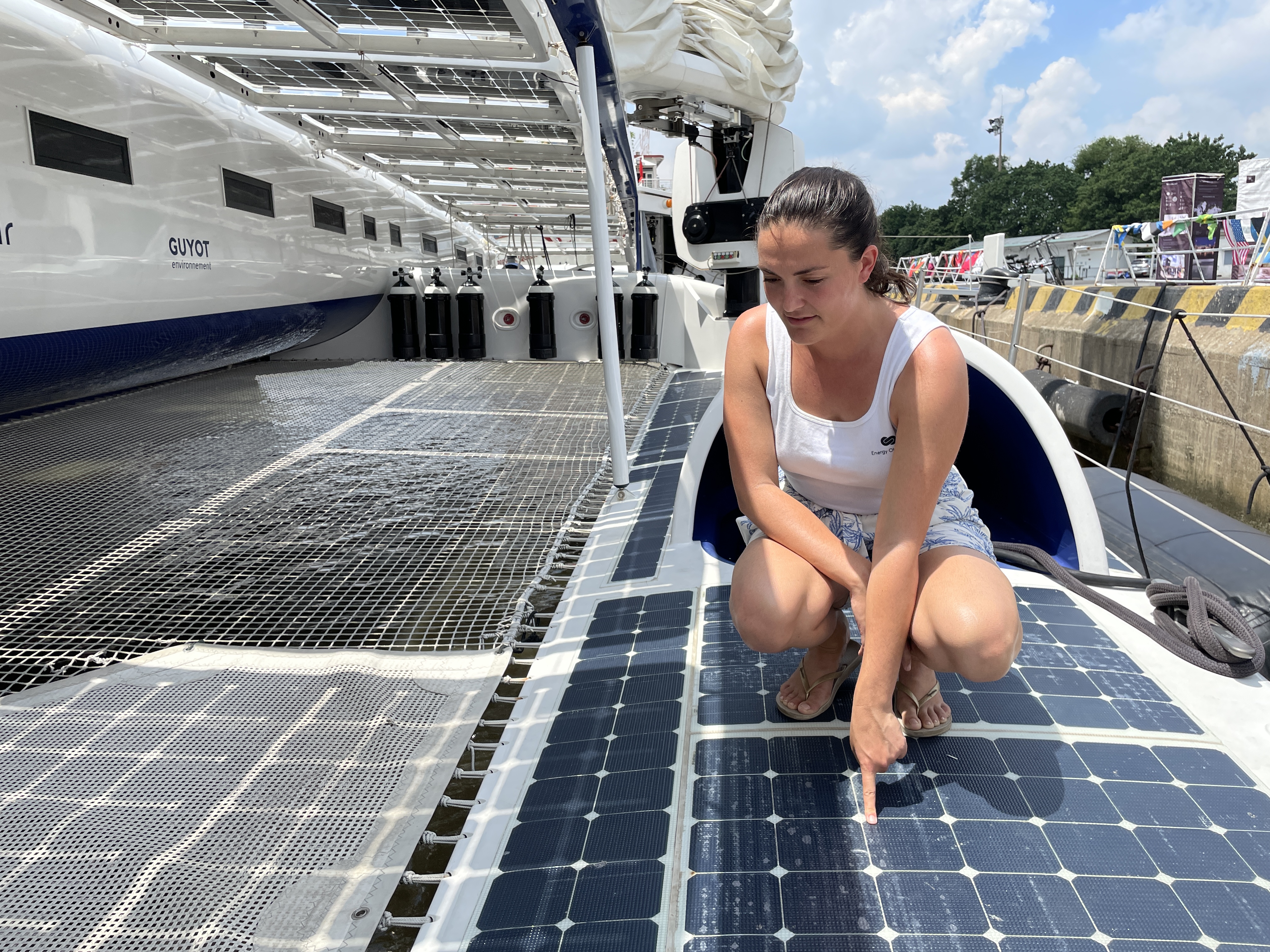 A crew member shows off the solar panels on the Energy Observer during its stopover in Ho Chi Minh City. Photo: Minh Khoi / Tuoi Tre