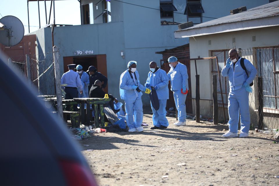Forensic personnel investigate after the deaths of patrons found inside the Enyobeni Tavern, in Scenery Park, outside East London in the Eastern Cape province, South Africa, June 26, 2022. Photo: Reuters