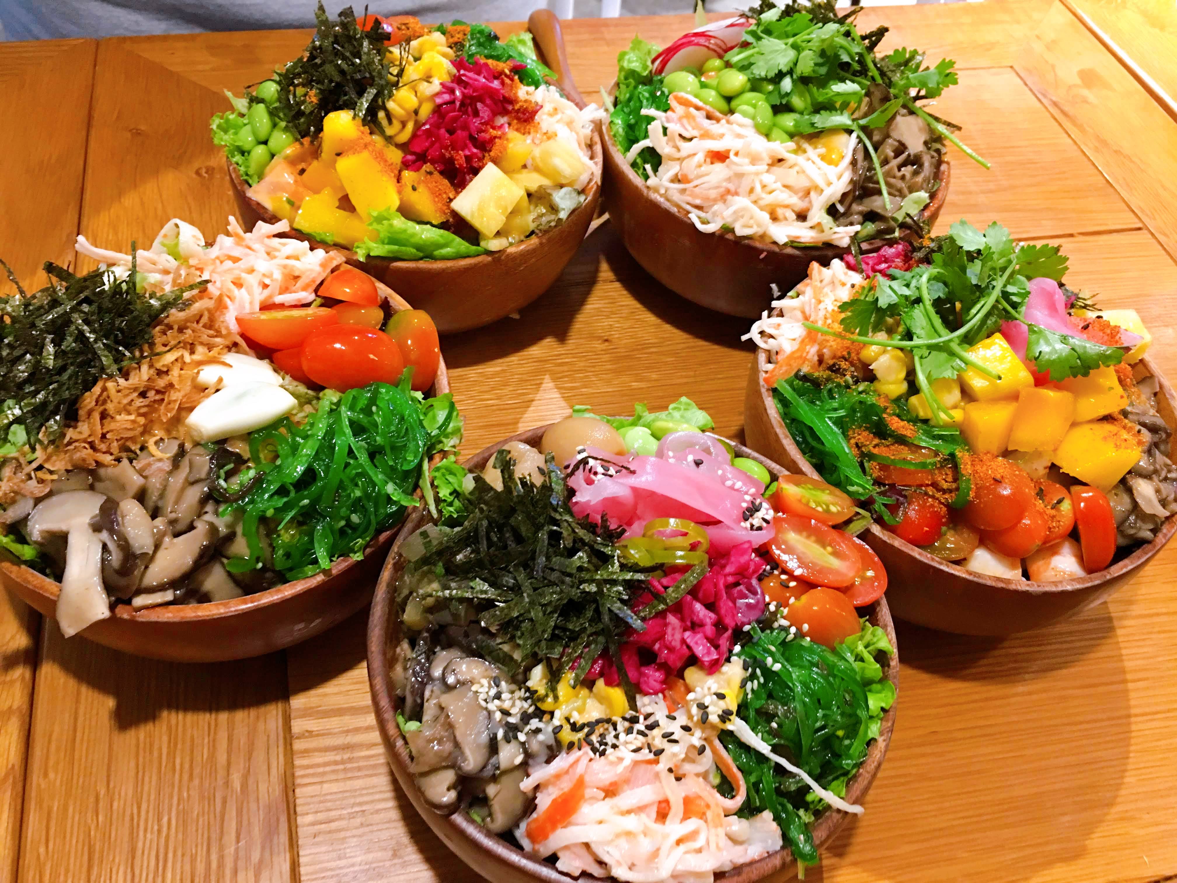 Bowls of Hawaiian poke salad are served at a poke shop in District 1, Ho Chi Minh City. Photo: Dong Nguyen / Tuoi Tre News