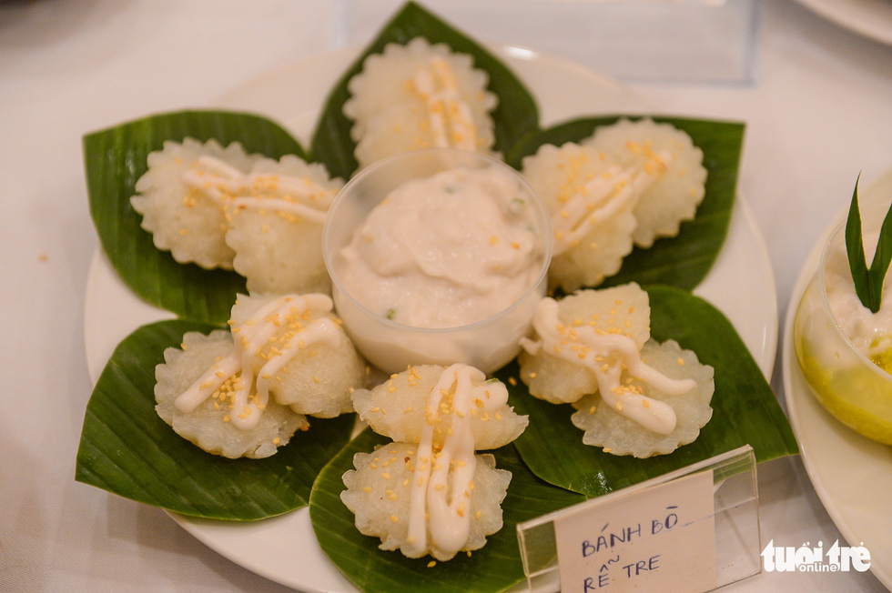 Banh bo – a Vietnamese steamed sponge cake dip with coconut milk. Photo: Quang Dinh / Tuoi Tre