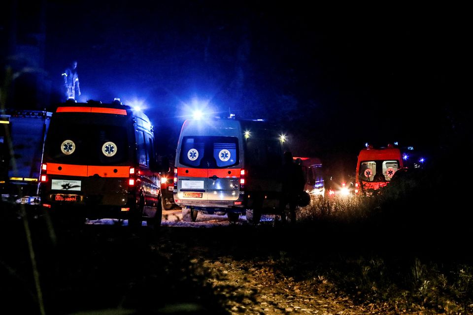 Ambulances are seen at the crash site of an Antonov An-12 cargo plane owned by a Ukrainian company, near Kavala, Greece, July 16, 2022. Photo: Laskaris Tsotsas/Eurokinissi via Reuters