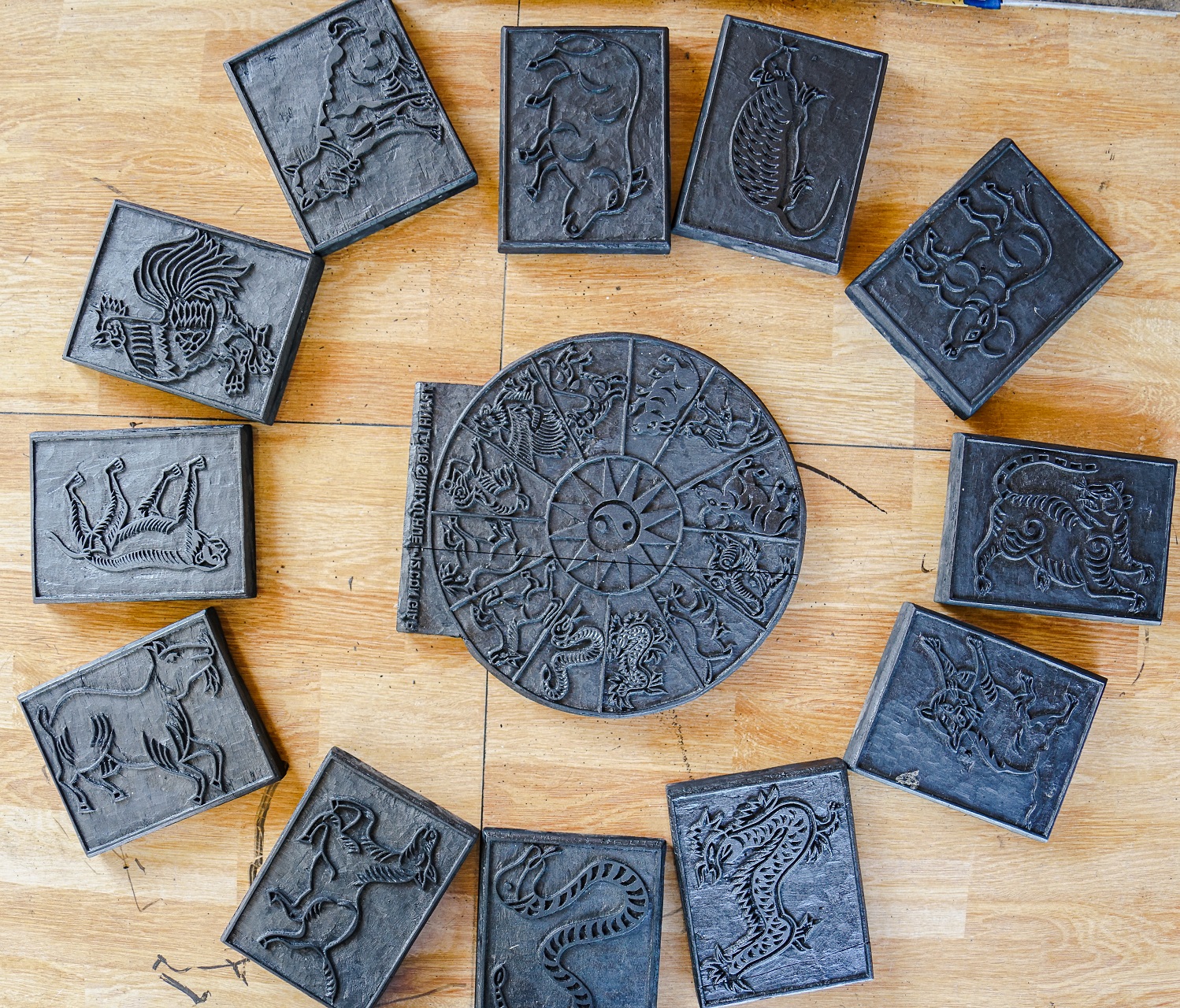 A set of woodblocks about 12 Zodiac signs. Photo: Nguyen Trung Au / Tuoi Tre News