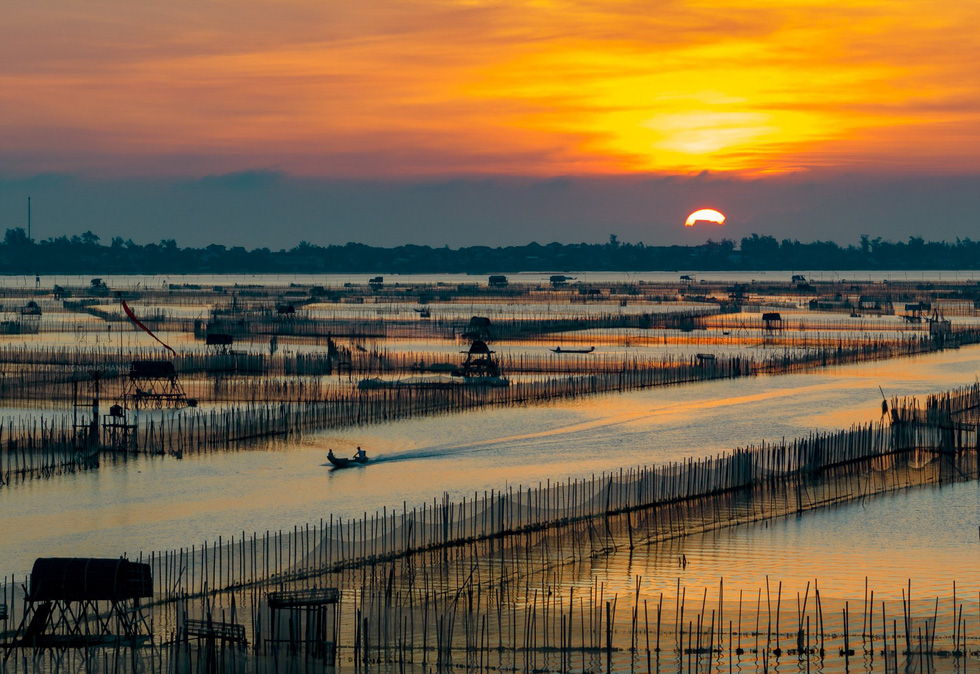 Experience a gorgeous sunrise on Chuon Lagoon in central Vietnam
