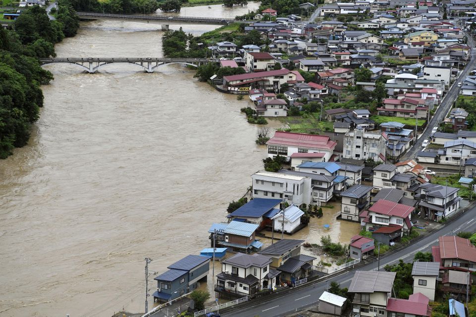A view shows a submerged residential area caused by a flood of the Mogami river, in Oe town, Yamagata prefecture, Japan August 4, 2022, in this photo taken by Kyodo. Photo: Mandatory credit Kyodo via REUTERS