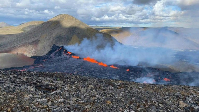 Lava spews out of a fissure in the ground after a volcano erupted in Iceland near Reykjavik. The eruption is deja vu in the region after the same volcano erupted for six months in March-September 2021. Photo: AFP