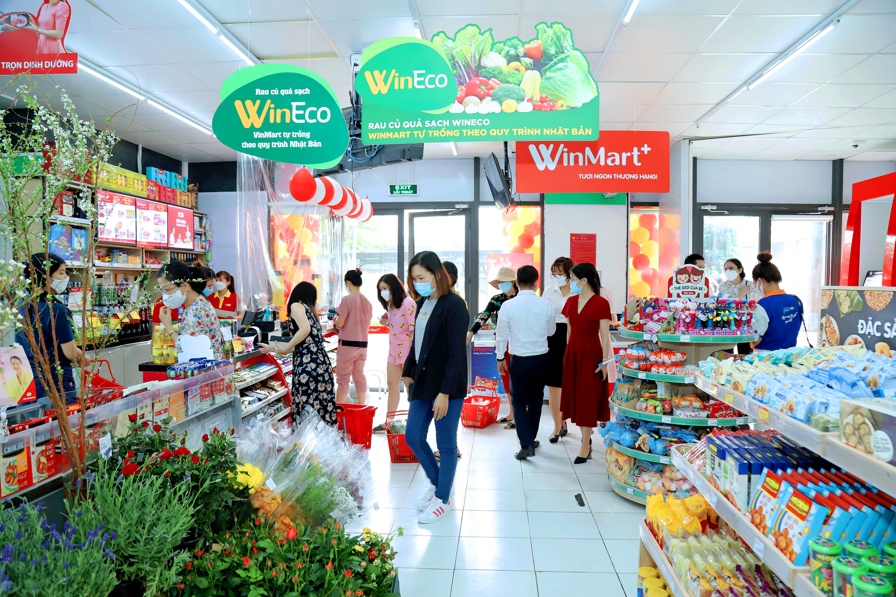 People shop at a retail store operated by Masan Group.