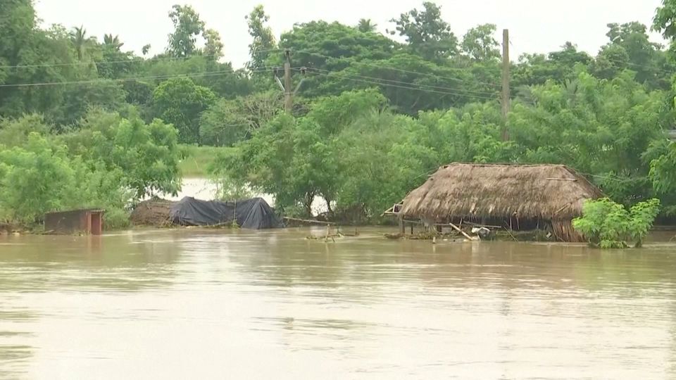 Huts get partially submerged in floodwater following heavy rains in Jagatsinghpur, Odisha, India August 20, 2022 in this screen grab obtained from a video. Photo: ANI via REUTERS